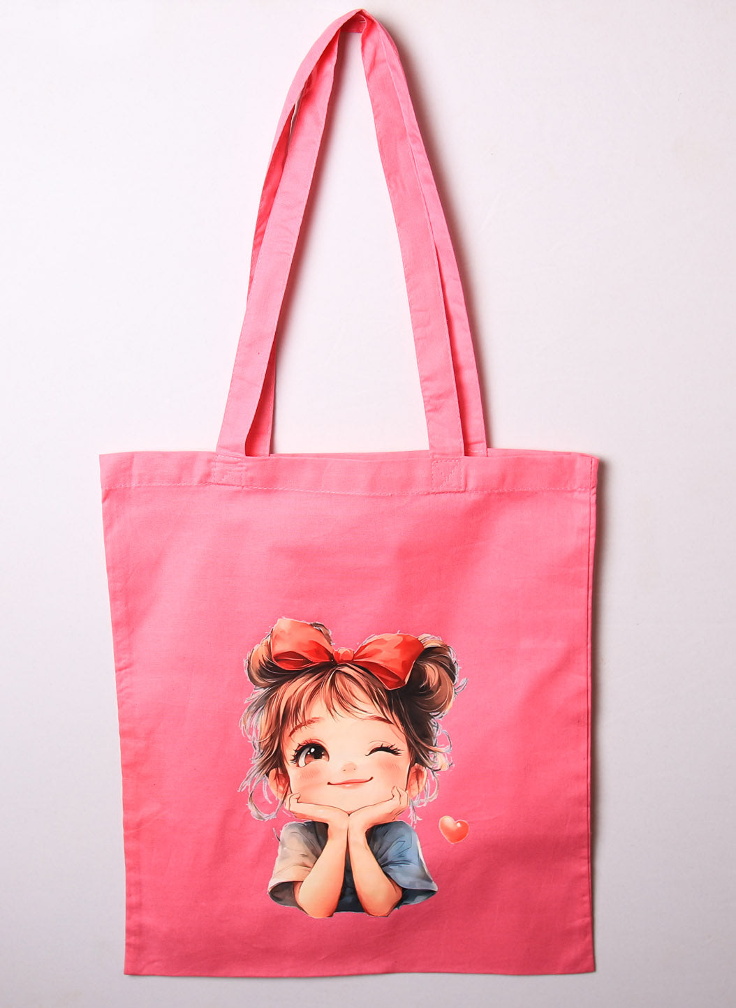 Pink tote bag with cute cartoon girl design